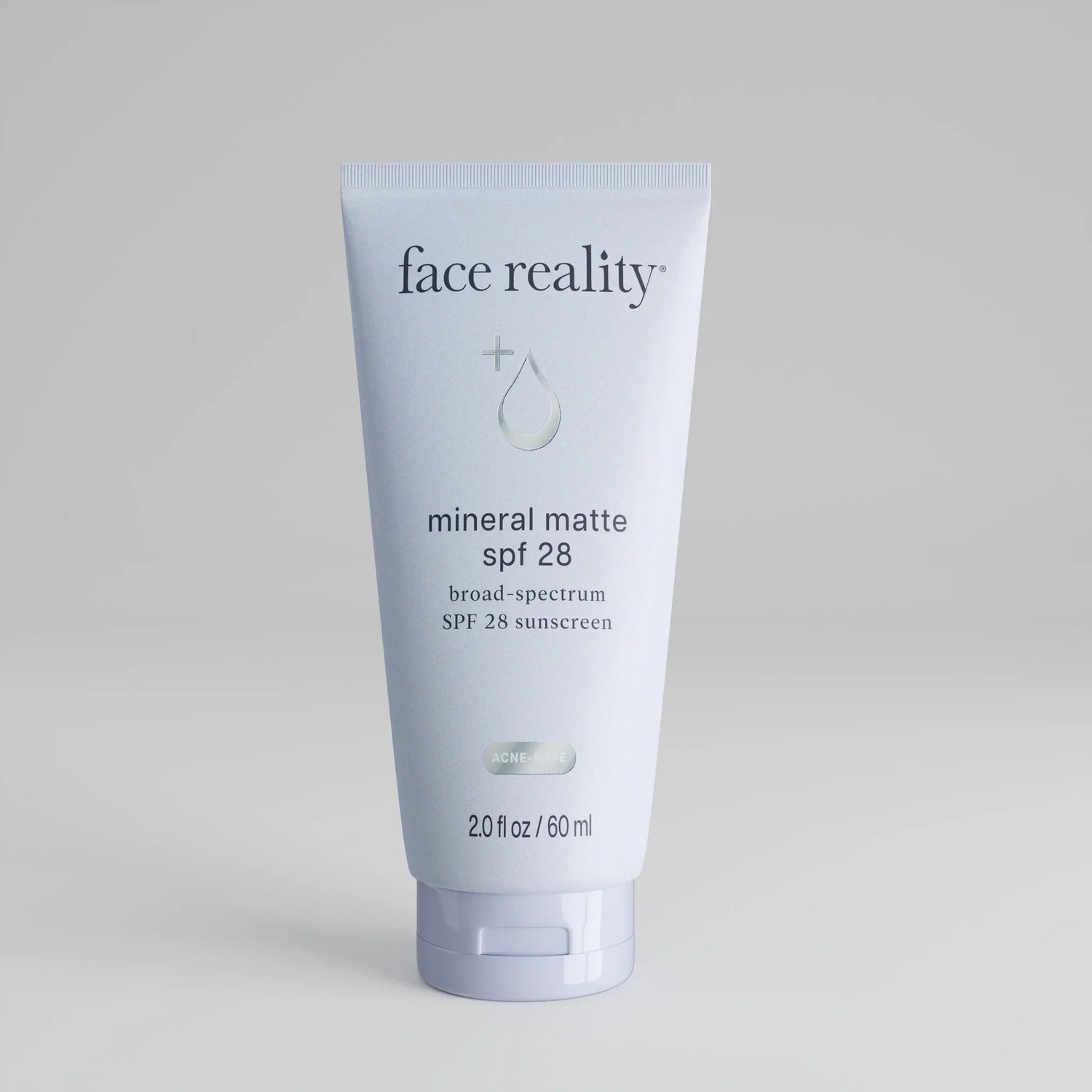 Mineral Matte SPF-28 sunscreen tube with broad-spectrum protection and matte finish.